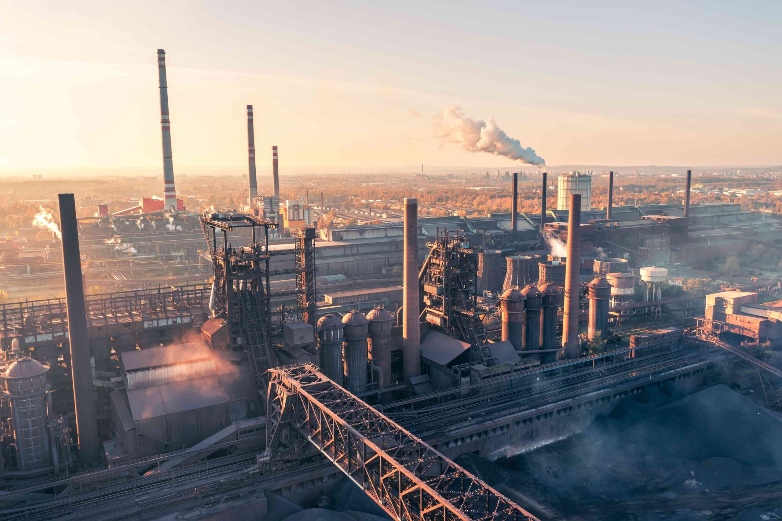 Smelter with blast from above during autumn afternoon. Heavy industry plant.